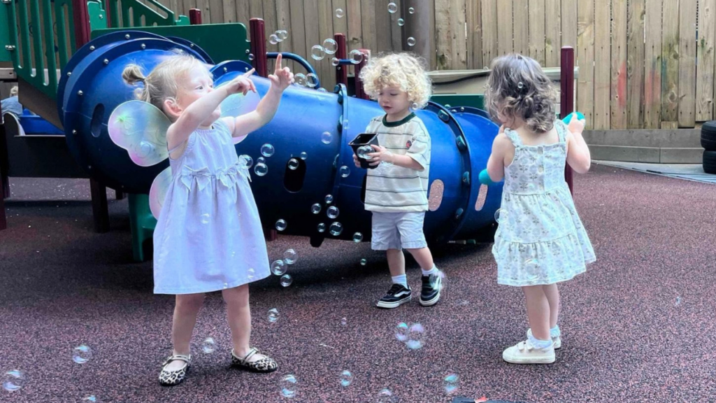 Children playing with bubbles